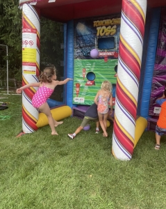 Carnival game booth set up at the Swim&Gym open house
