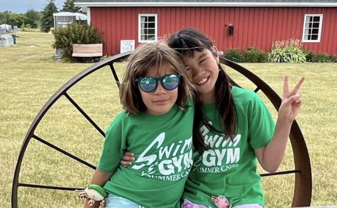 camp girls making friends farm