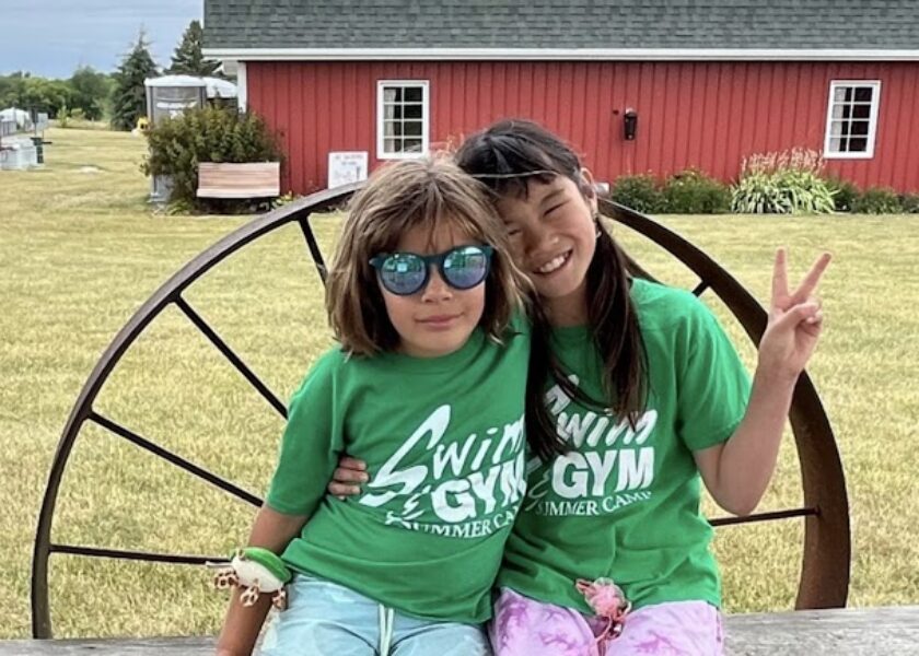 camp girls making friends farm